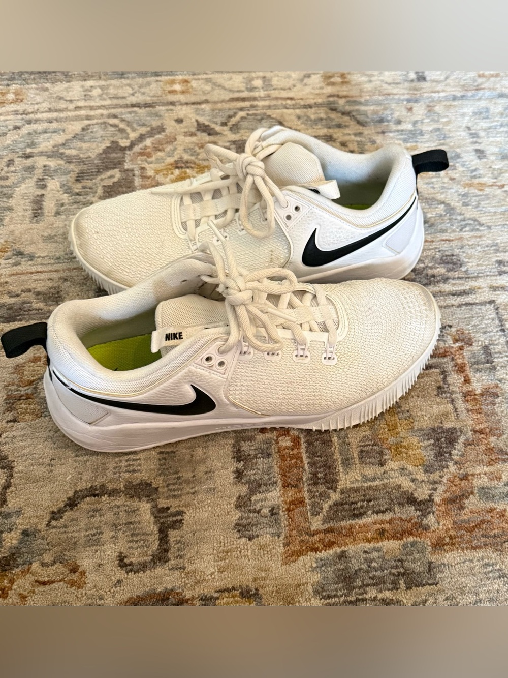 Nike women’s White Athletic Sneakers with Black Swoosh and Neon Green Lining